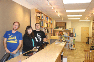 The Book Odyssey owners, from left, Tom Miller Donnelly, Kristi Crawford and Evan Miller-Donnelly. Photo by Heather Young