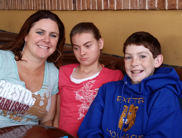 Jocelyn Dyer, 21, center, sits with her mother, Jennifer, and brother Jaden. Photo courtesy of Jennifer Dyer