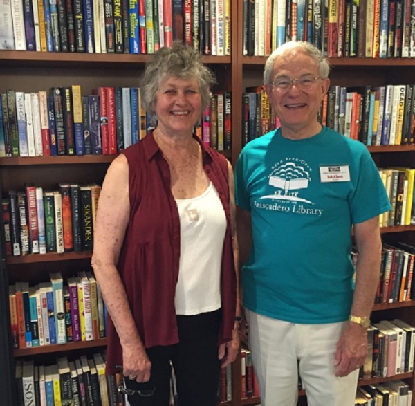 Grenda Ernst, former president of the Atascadero Friends of the Library, and current president Bob Alberti were pleased to join hundreds in celebrating Atascadero Library's first anniversary Saturday.  Photo by Paula McCambridge