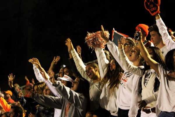 Fans in the "Dog Pound" hold up four fingers and shout "Four!", as is tradition at the beginning of every fourth quarter during a Greyhound game.