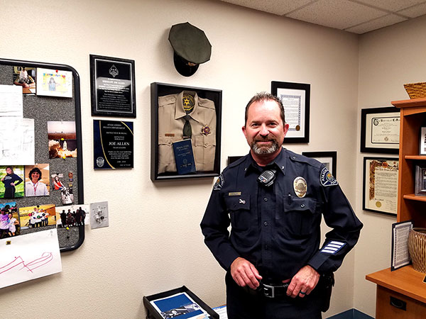 Commander Joe Allen of the Atascadero PD in his office, with goatee (photo Jordan Elgrably)