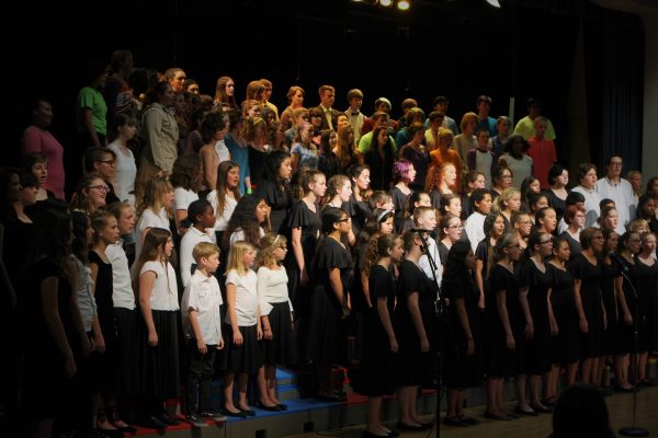 The combined choirs act was the act that brought all members of AUSD choir together to sing in harmony.