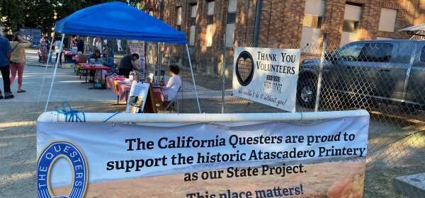 Questers sign at the event