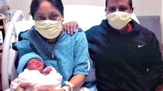 Jorge Luis and Family -- First Baby of New Year at Twin Cities