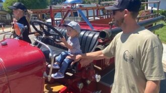 Bowain dad and kids on truck