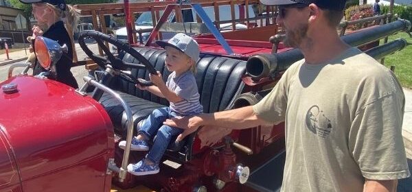 Bowain dad and kids on truck