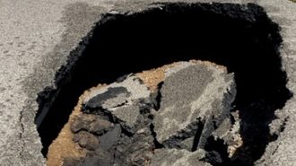 Photo of sinkhole on the northbound shoulder of Hwy. 41