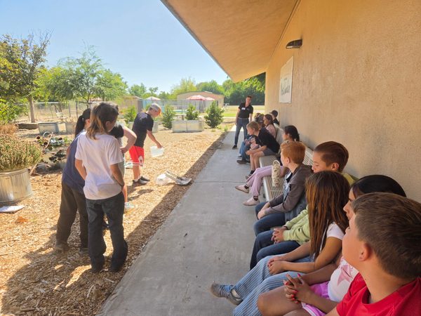 Creston Elementary students watch a hands-on erosion lesson