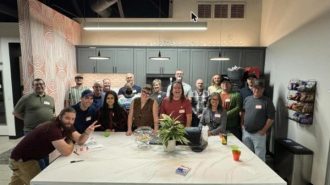 Attendees pose for a group photo at a previous Central Coast Tech Networking Mixer