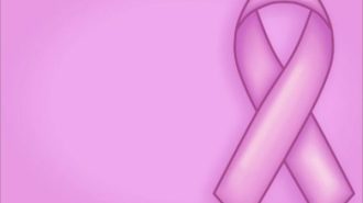 A pink ribbon, the symbol of breast cancer awareness.